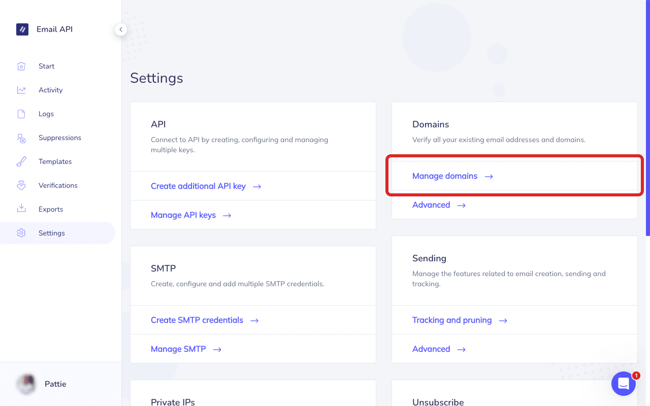 Haz clic en «Gestionar dominios» en la página de configuración