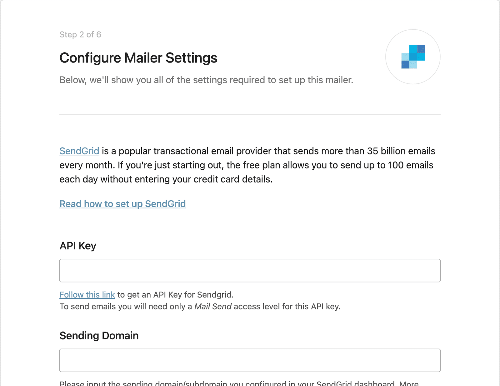 WP Mail SMTP Setup Wizard SendGrid settings step showing the API Key and Sending Domain fields
